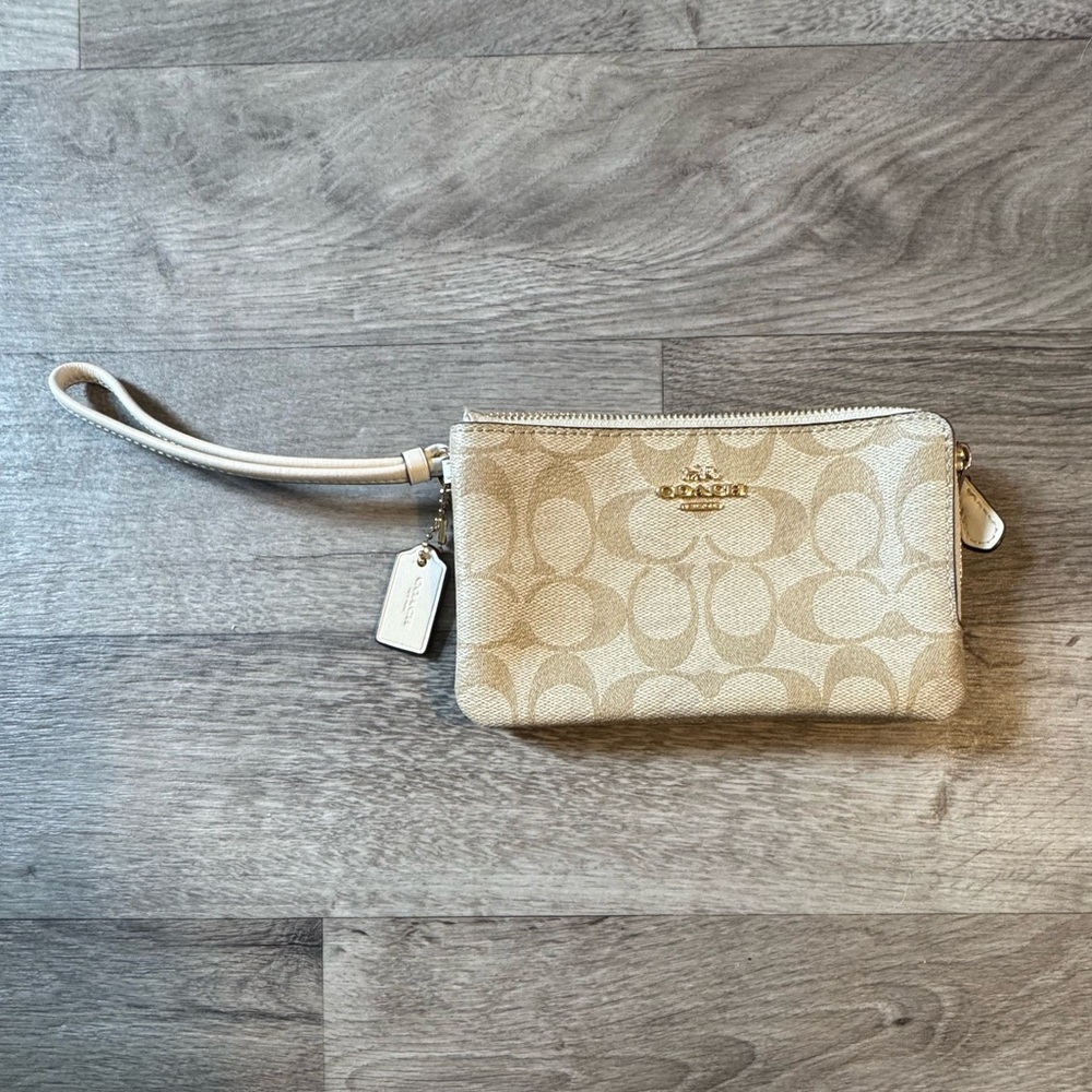 Coach Cream Clutch with Signature Pattern and Gold Hardware